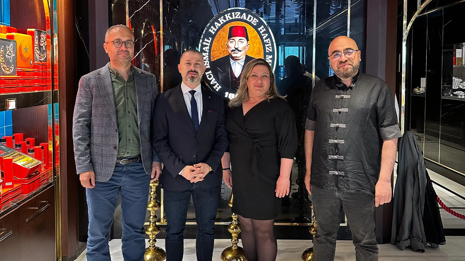 Turkish Business Forum delegation and Hafiz Mustafa 1864 London management posing together during a corporate visit in the London branch.